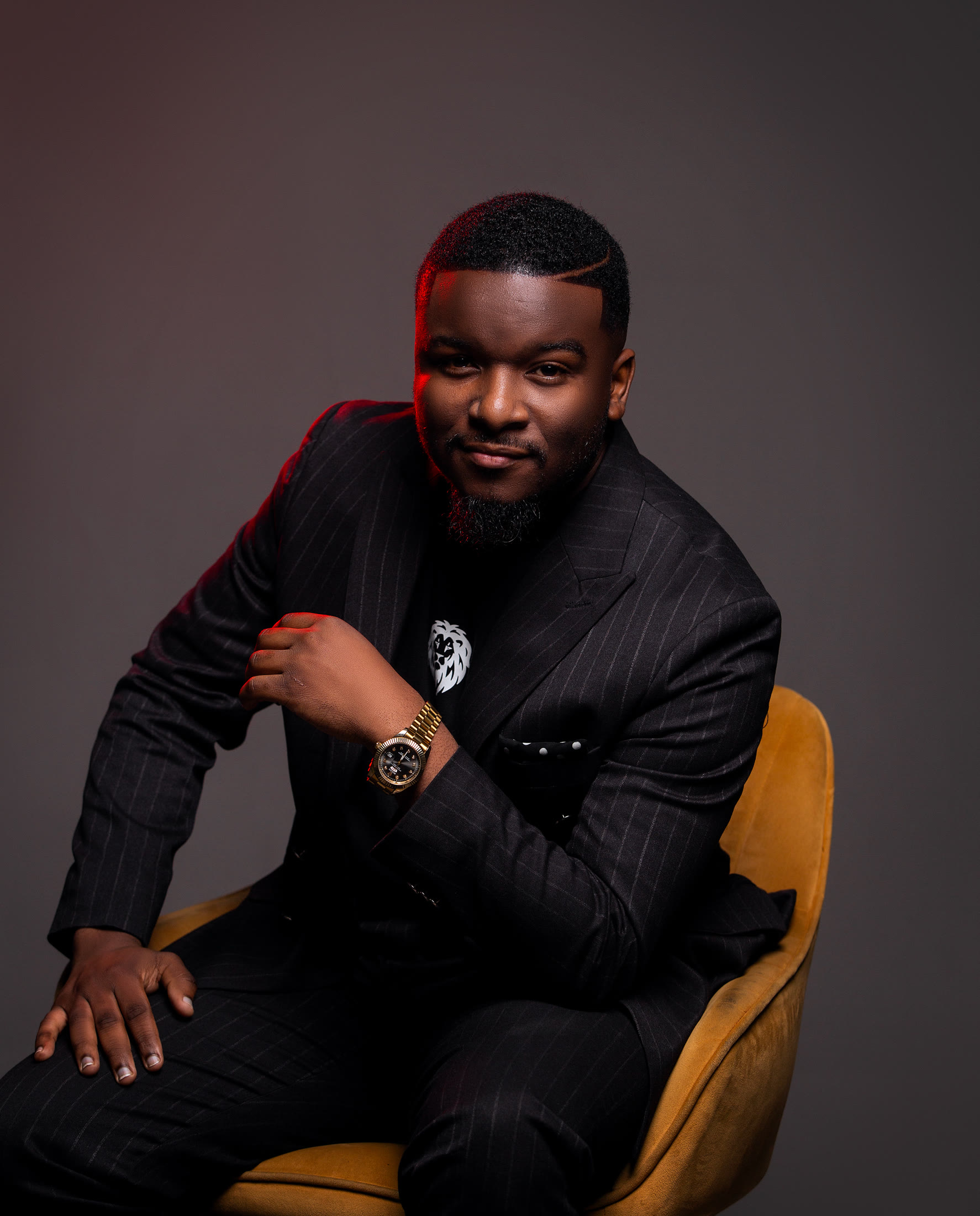 Shalom Matunhira, founder of Shalom Musiq, in a suit